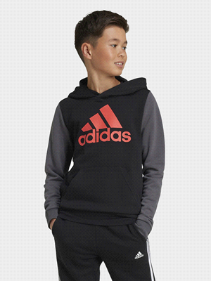 Questa felpa con cappuccio adidas junior è perfetta per tutti i tuoi impegni quotidiani. Il motivo colorblock e il logo oversize mostrano a tutti la tua passione per adidas. I polsini a coste tratteng... 