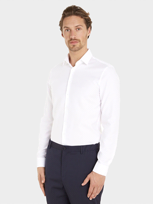 La camicia CALVIN KLEIN BASICA STRETCH LAVORATA SLIM FIT è caratterizzata da un collo a punta, maniche lunghe, una chiusura a bottoni e un logo monogramma Calvin Klein sul petto. Realizzata in cotone ... 