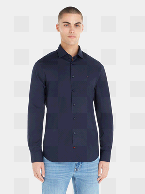 La camicia TOMMY HILFIGER FLEX SLIM FIT è la scelta ideale per un look smart casual elegante e raffinato. Realizzata in popeline di cotone stretch, questa camicia con  tecnologia Tommy Hilfiger Flex o... 