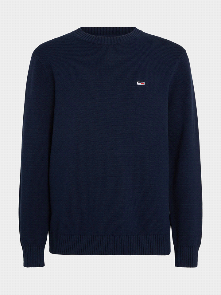 La maglia TOMMY JEANS GIRO ESSENTIAL è realizzata al 100% in cotone e pesa 680 g, mentre il design presenta un girocollo classico, con colletto, polsini e orlo elasticizzati a coste per un aspetto pul... 