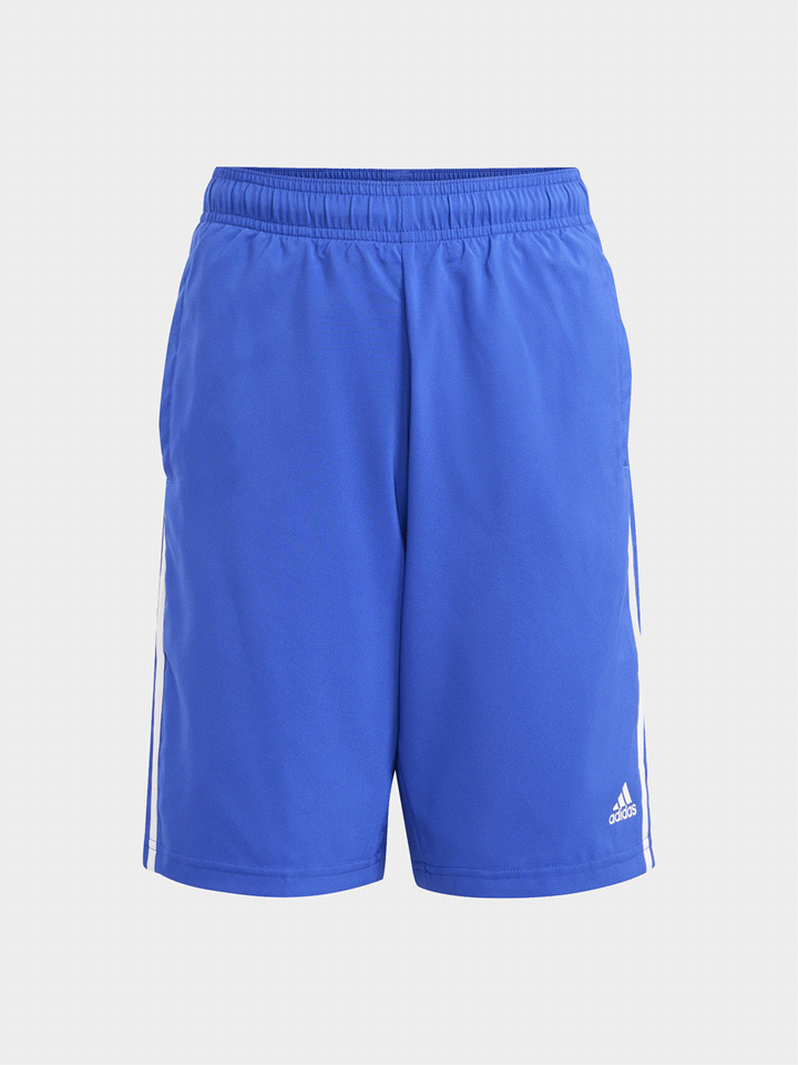 Modello versatile realizzato con materiali riciclati. ADIDAS Short Essentials 3-Stripes Woven BERMUDA BAMBINO Bianco  ... 